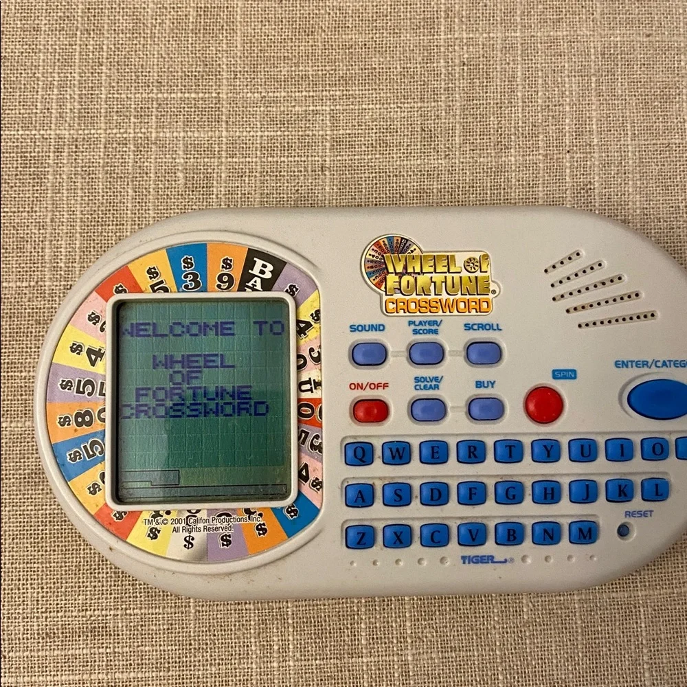 Wheel of Fortune Crossword Electronic Handheld Travel Game - White